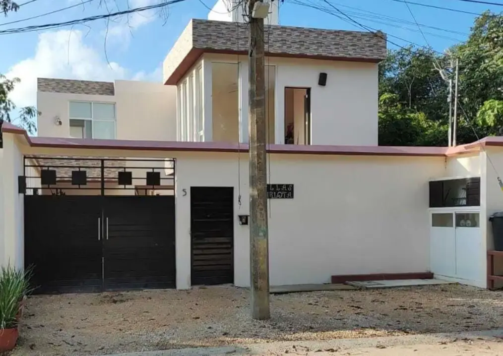 Villas Carlota Cancún · Habitaciones amplias con desayuno incluido